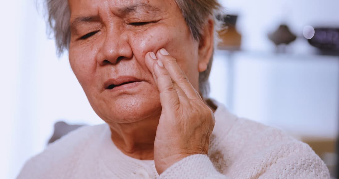 asian elderly woman suffering from toothache asian elderly woman suffering from toothache